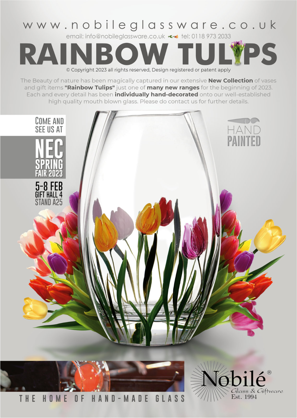 A glass vase filled with colorful tulips on a gray background, with text that says rainbow tulips