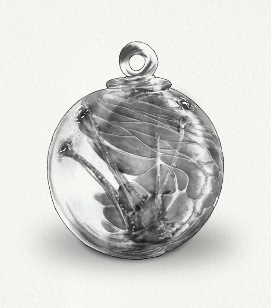 A glass ornament with a detailed illustration of a leaf inside